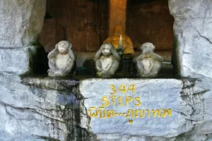 BANGKOK, THAILAND – APRIL 13, 2022: Wat Saket is a Temple with a beautiful view of Bangkok. 344 stairs lead to the top of the Golden Mountain. Beautiful Tropical Garden near the stairs.