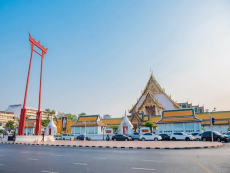 The giant swing (Sao Ching Cha) and Wat Suthat temple in Bangkok, Thailand, Sunny day cleare blue sky.