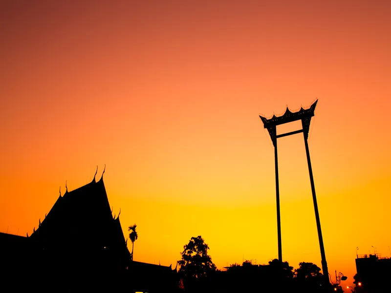 art of silhouette giant swing and Suthat Thepphawararam temple in central of Bangkok.