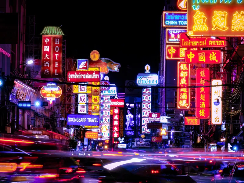 Bangkok,Thailand, April 10,2024 : Monks pray in front of the main Buddha image in the chapel of Yaowarat Road. stillness of mind Spread religion and study Dhamma. golden Buddha statue