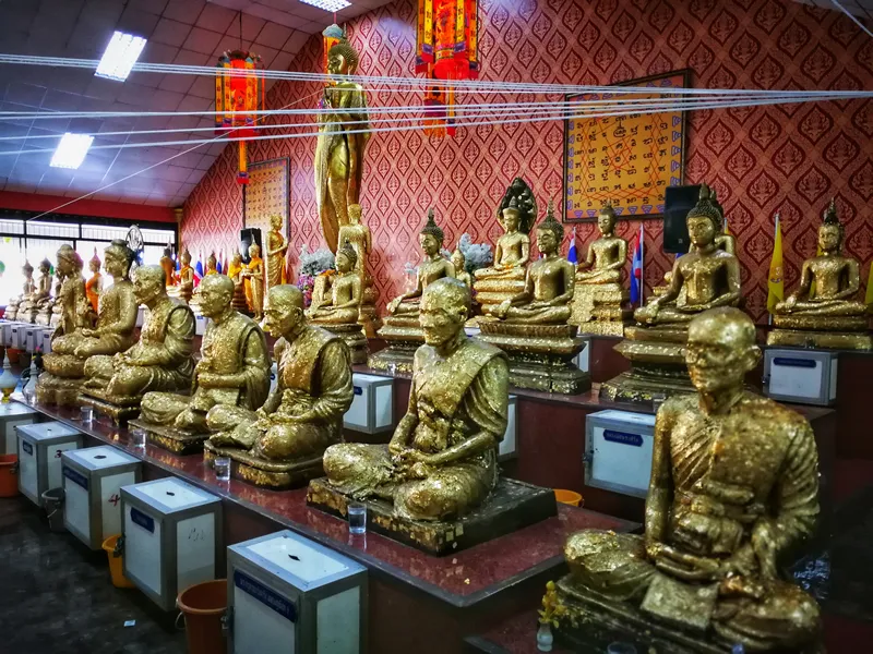 Bangkok, Thailand - April 7, 2019 : Gold plates on buddha,The Buddha statue to gild with gold leaf